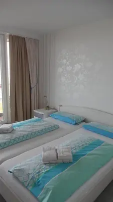 Ein Bett oder Betten in einem Zimmer der Unterkunft Haus Nordseeblick, App 26