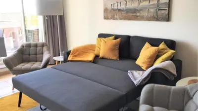 Ein Sitzbereich in der Unterkunft Haus Nordseeblick, App 09