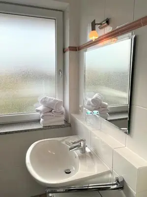 Ein Badezimmer in der Unterkunft Haus Nordseeblick, App 15