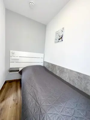 Ein Bett oder Betten in einem Zimmer der Unterkunft Lord Nelson 218