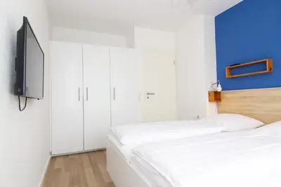 Ein Bett oder Betten in einem Zimmer der Unterkunft Marina 24-A