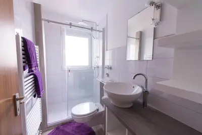 Ein Badezimmer in der Unterkunft Haus Seehund
