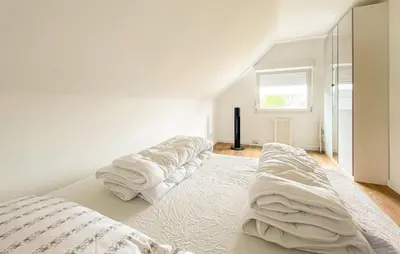 Ein Bett oder Betten in einem Zimmer der Unterkunft Stunning Home In Friedrichskoog With Wifi