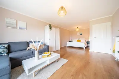 Ein Bett oder Betten in einem Zimmer der Unterkunft Küstenjunge 