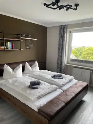 Ein Bett oder Betten in einem Zimmer der Unterkunft Wohnung Strandhafer (Nr. 49) - Haus Rainer