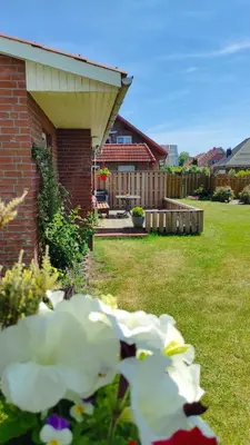Ein Garten an der Unterkunft Dat Hus