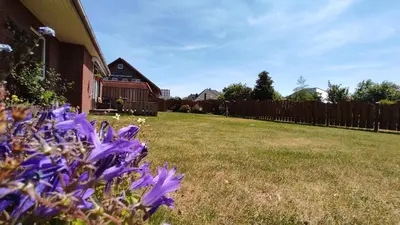 Ein Garten an der Unterkunft Dat Hus
