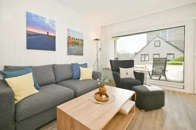 Ein Sitzbereich in der Unterkunft Wohnung Knütt