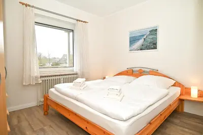 Ein Bett oder Betten in einem Zimmer der Unterkunft Wohnung Knütt