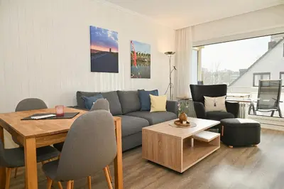 Ein Sitzbereich in der Unterkunft Wohnung Knütt