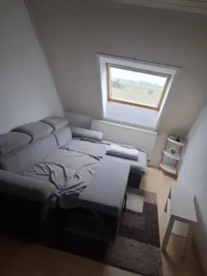 Ein Bett oder Betten in einem Zimmer der Unterkunft Schöne Doppelhaushälfte am Meer!