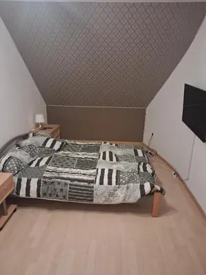 Ein Bett oder Betten in einem Zimmer der Unterkunft Schöne Doppelhaushälfte am Meer!
