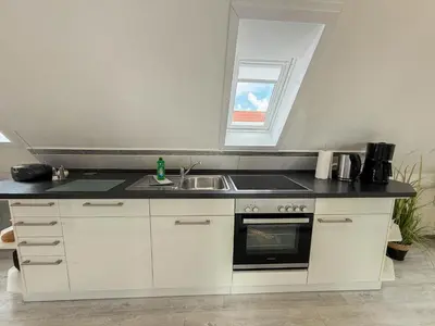Küche/Küchenzeile in der Unterkunft An de Warft Wohnung 5