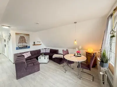 Ein Sitzbereich in der Unterkunft An de Warft Wohnung 5