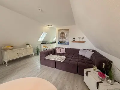 Ein Sitzbereich in der Unterkunft An de Warft Wohnung 5