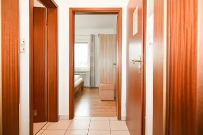 Ein Bett oder Betten in einem Zimmer der Unterkunft Strandkoje Büsum