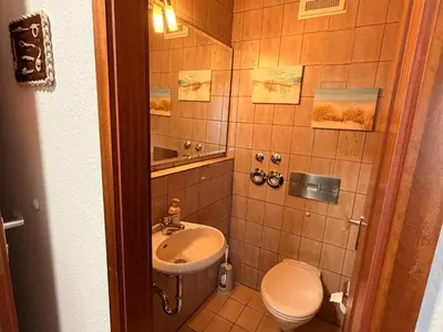 Ein Badezimmer in der Unterkunft Haus Jan am Strand App WattenGlück