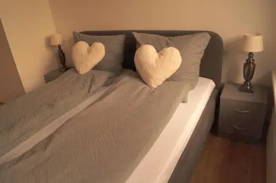 Ein Bett oder Betten in einem Zimmer der Unterkunft Gesamte Unterkunft in Friedrichskoog