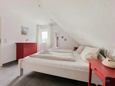 Ein Bett oder Betten in einem Zimmer der Unterkunft Residenz Liegeplatz