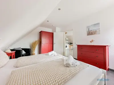Ein Bett oder Betten in einem Zimmer der Unterkunft Residenz Liegeplatz