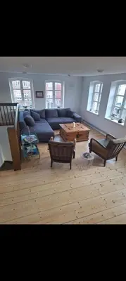 Ein Sitzbereich in der Unterkunft Schleusenwärterhaus am Ostedeich