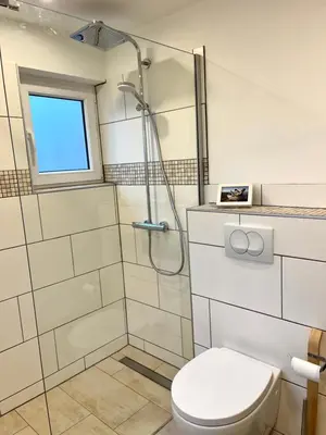 Ein Badezimmer in der Unterkunft Ferienwohnungen am Wattenmeer