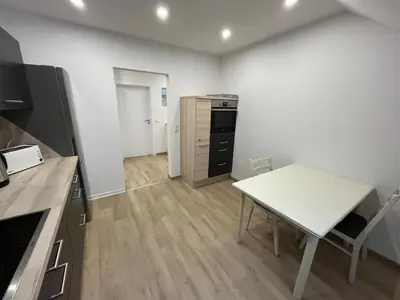 Küche/Küchenzeile in der Unterkunft HörnQuartier - modern eingerichtete Ferienwohnung - Familienfreundlich, ideal auch für Geschäftskunden