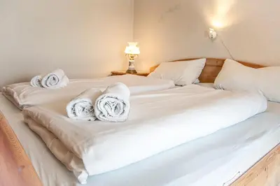 Ein Bett oder Betten in einem Zimmer der Unterkunft Haus Horizont I HZ06