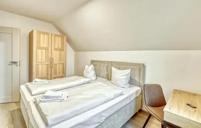 Ein Bett oder Betten in einem Zimmer der Unterkunft Lovely Home In Wurster Nordseeküste With Sauna