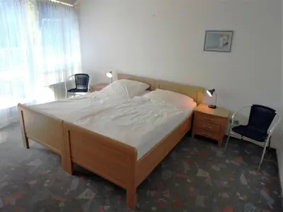 Ein Bett oder Betten in einem Zimmer der Unterkunft Residenz Nordfeldstraße