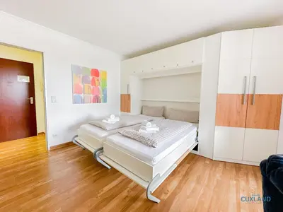 Ein Bett oder Betten in einem Zimmer der Unterkunft Lord Nelson Wohnung 118
