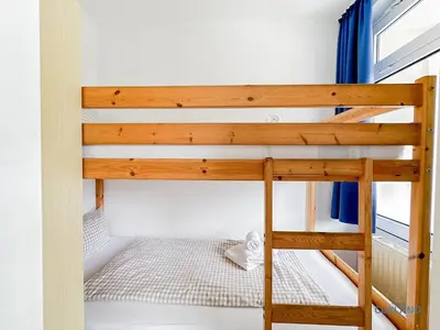 Ein Bett oder Betten in einem Zimmer der Unterkunft Lord Nelson Wohnung 118