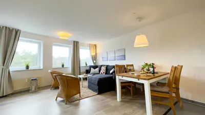 Ein Sitzbereich in der Unterkunft Haus Nordseebrandung FeWo B3 2