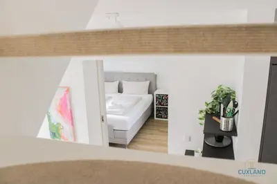 Ein Bett oder Betten in einem Zimmer der Unterkunft Ferienhaus am Ringwall 19