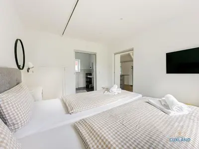 Ein Bett oder Betten in einem Zimmer der Unterkunft Ferienhaus am Ringwall 19