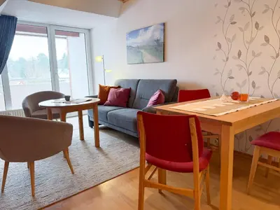 Ein Sitzbereich in der Unterkunft Land & Meer Wohnung 22