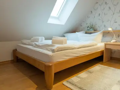 Ein Bett oder Betten in einem Zimmer der Unterkunft Land & Meer Wohnung 22