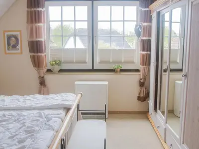 Ein Bett oder Betten in einem Zimmer der Unterkunft Apartment Watt in Friedrichskoog-Spitze by Interhome