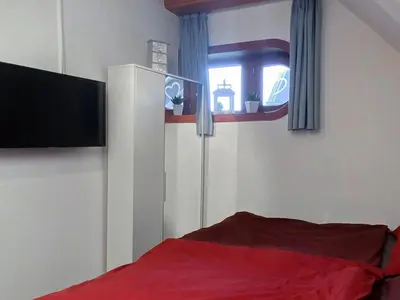 Ein Bett oder Betten in einem Zimmer der Unterkunft Apartment Moin-Moin in Friedrichskoog-Spitze by Interhome