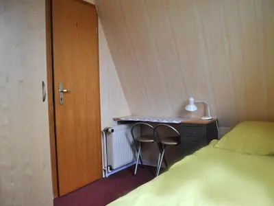 Ein Bett oder Betten in einem Zimmer der Unterkunft Holiday Home Sonniges Ferienhaus hinter dem Deich by Interhome