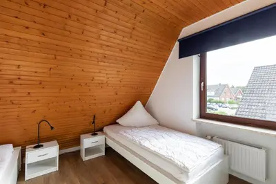 Ein Bett oder Betten in einem Zimmer der Unterkunft haven-apartments Duhnen