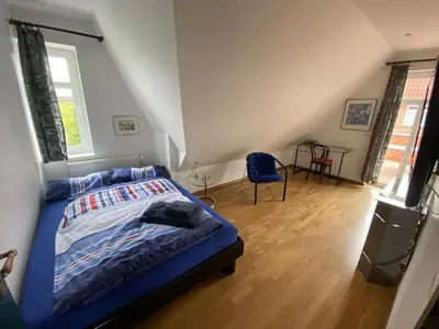 Ein Bett oder Betten in einem Zimmer der Unterkunft Holiday home with 4 bedrooms