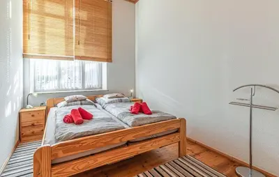 Ein Bett oder Betten in einem Zimmer der Unterkunft Zur alten Dorfschule