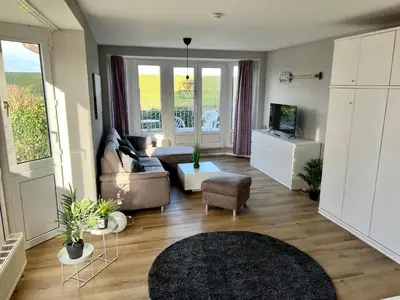 Ein Sitzbereich in der Unterkunft Apartment Nordseeperle by Interhome