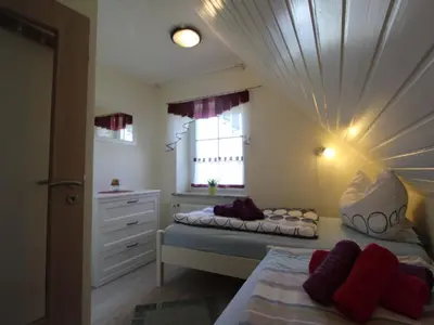 Ein Bett oder Betten in einem Zimmer der Unterkunft Apartment FeWo Herzmuschel by Interhome