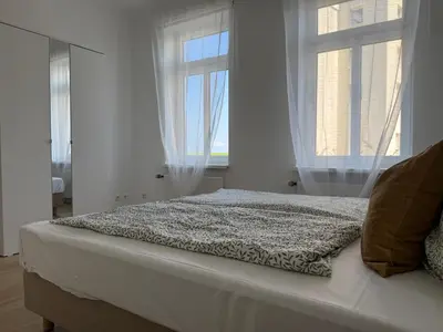 Ein Bett oder Betten in einem Zimmer der Unterkunft Apartment Bake9 - Tide