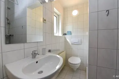 Ein Badezimmer in der Unterkunft Strandkorb 12 - FeWo 2