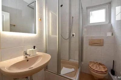 Ein Badezimmer in der Unterkunft Strandkorb 12 - FeWo 1