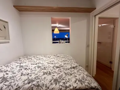 Ein Bett oder Betten in einem Zimmer der Unterkunft Frische Brise 704