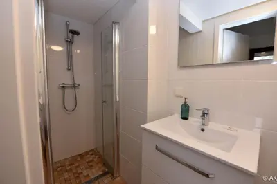 Ein Badezimmer in der Unterkunft Strandkorb 12 - Studio